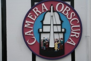 Camera Obscura logo on the top of the tower
